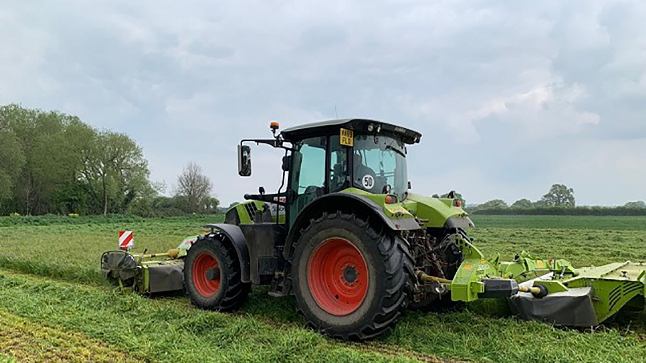 Mowing grass with a CLAAS Disco in May