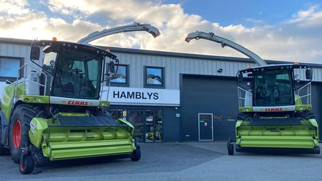 CLAAS foragers positioned at the entrance of our customer evening