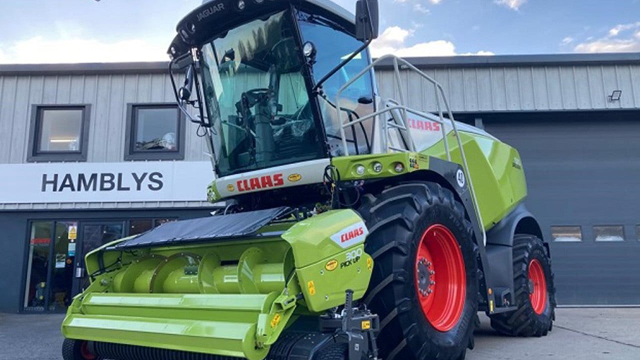 CLAAS forager at the entrance of a Hamblys depot